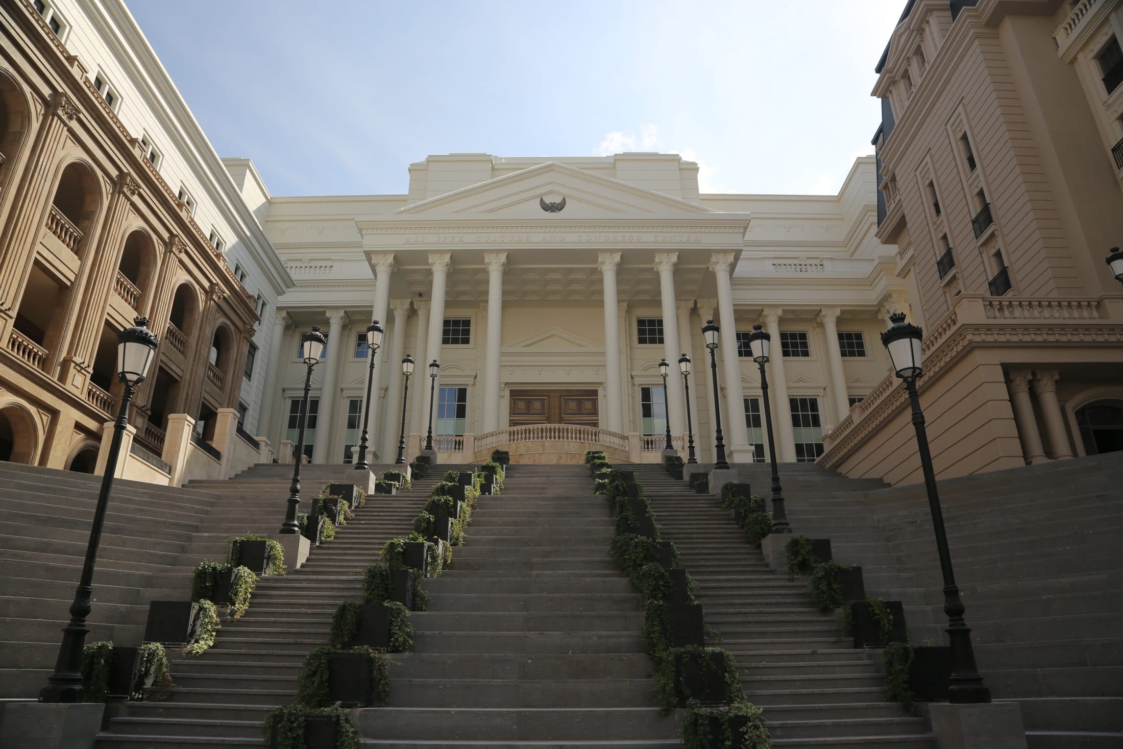 A wide staircase and portico inscribed Ali İpek Culture and Congress Center.